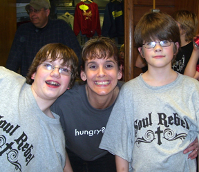 Youth Director with two students Youth Director with two students